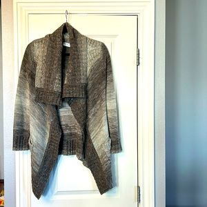 Like New cardigan sweater.